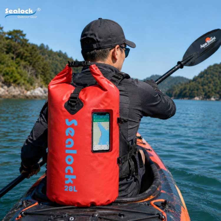 Red Sealock waterproof backpack with a phone viewing window for kayaks, used to display navigation